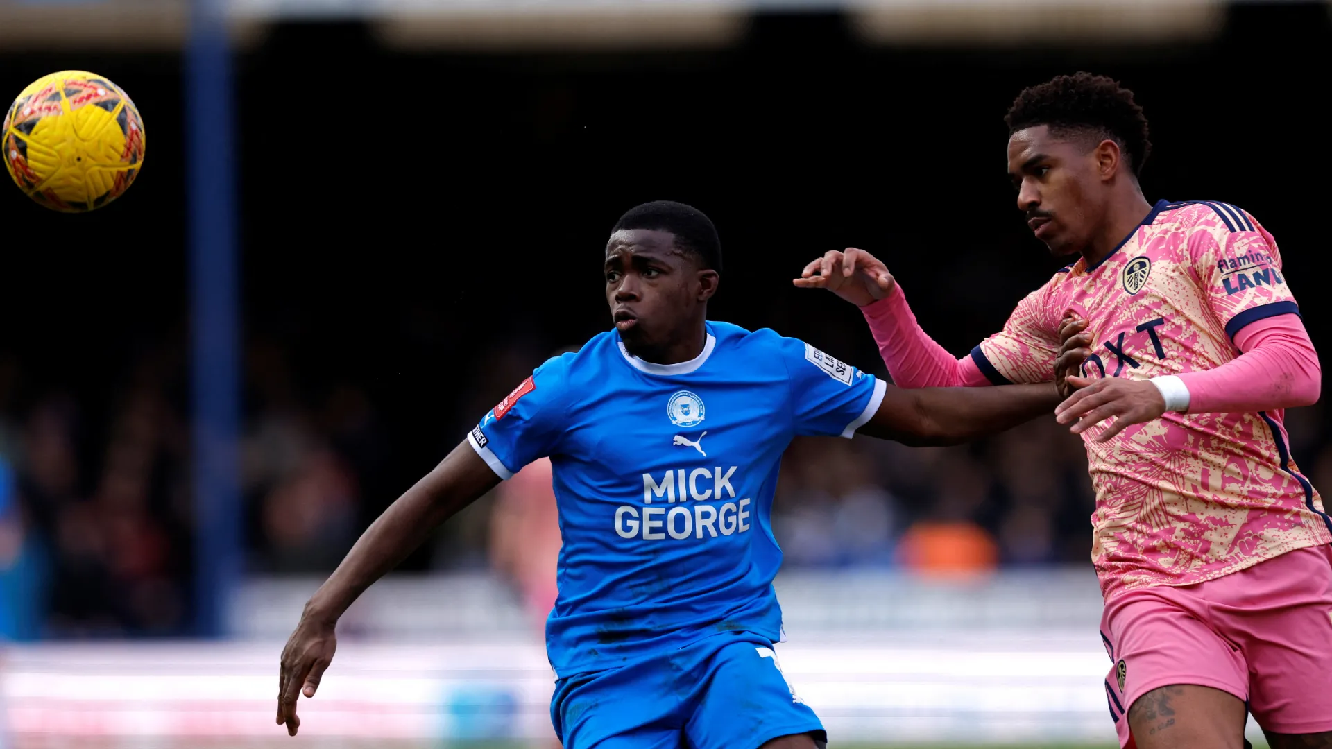 Kwame Poku khi còn thi đấu cho Peterborough United, trước khi chuyển đến QPR
