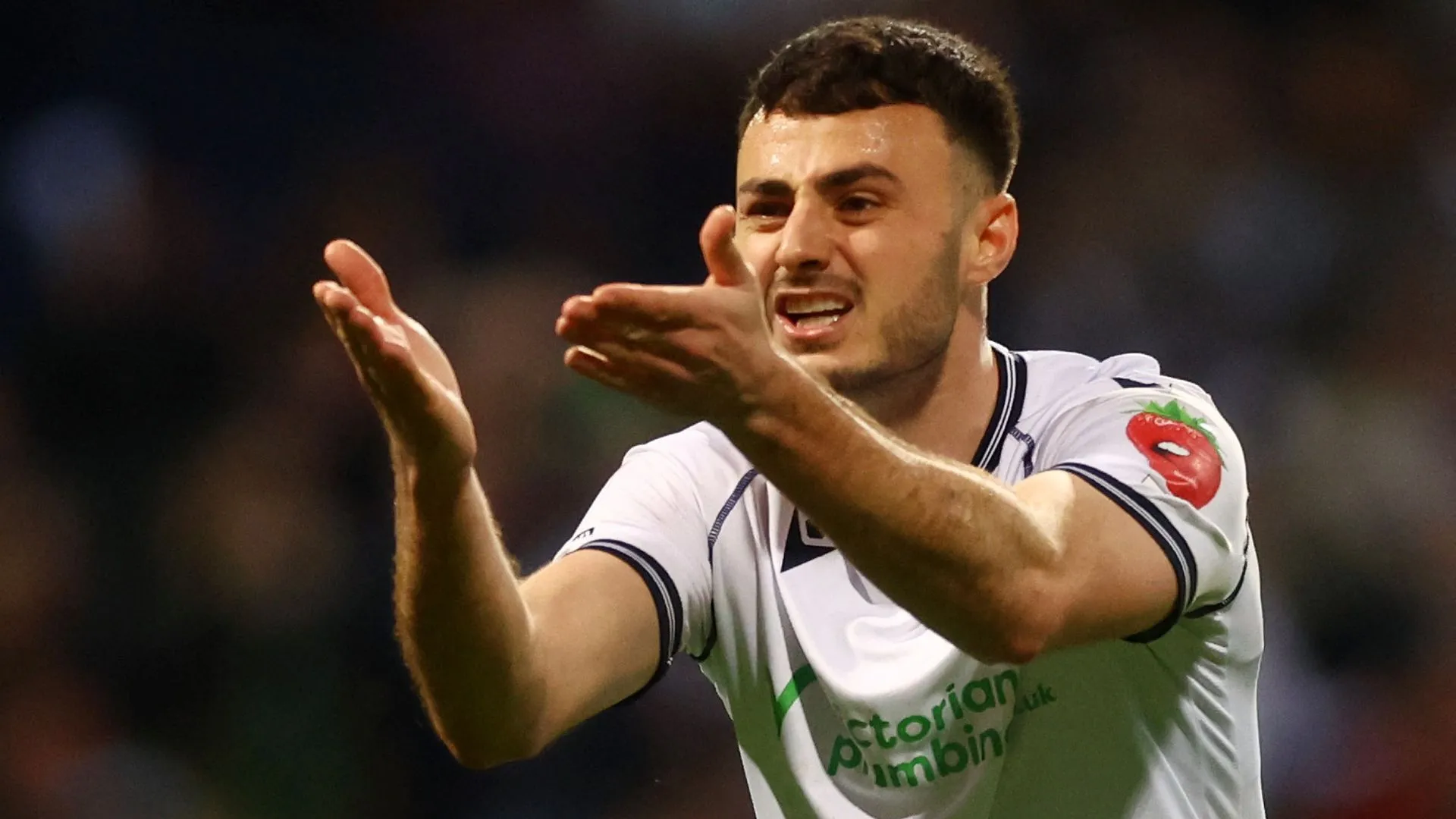 Tiền đạo Aaron Collins trong màu áo Bolton Wanderers trước khi chuyển đi.